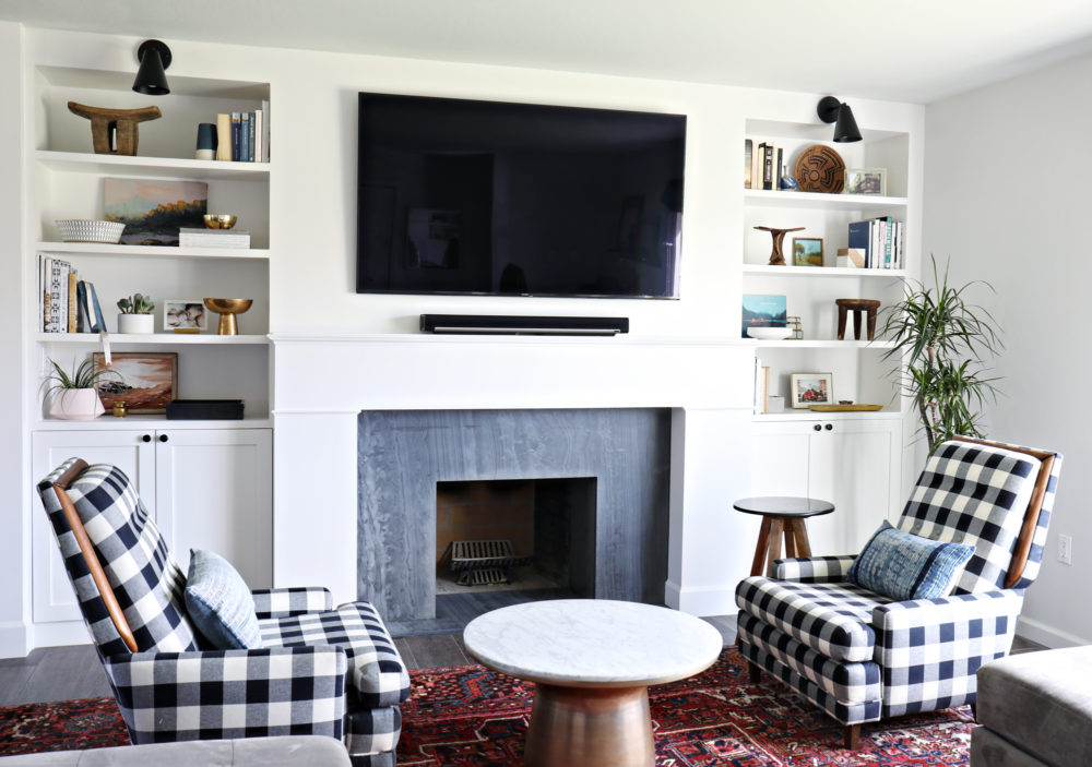 Built in shelving with soapstone fireplace and gingham chairs | brittanyMakes
