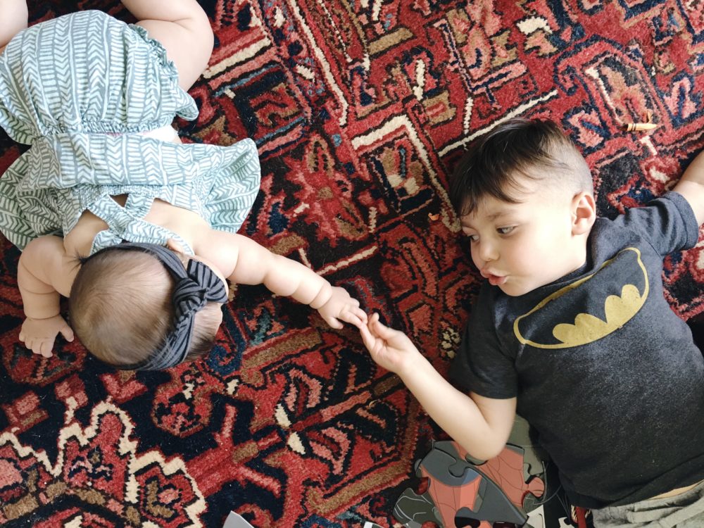 cute kids on vintage rug