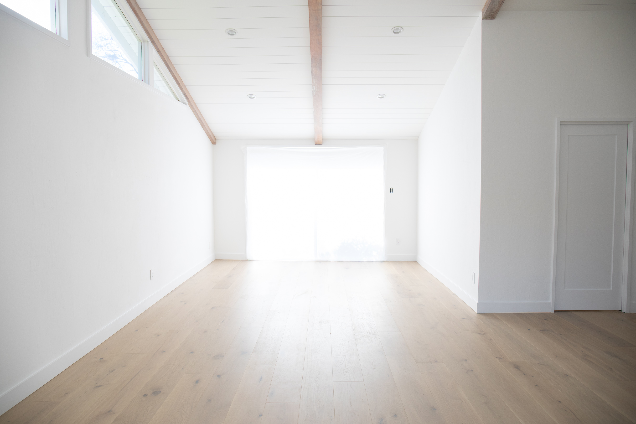 Vaulted ceiling, white shiplap ceiling paneling, master suite renovation