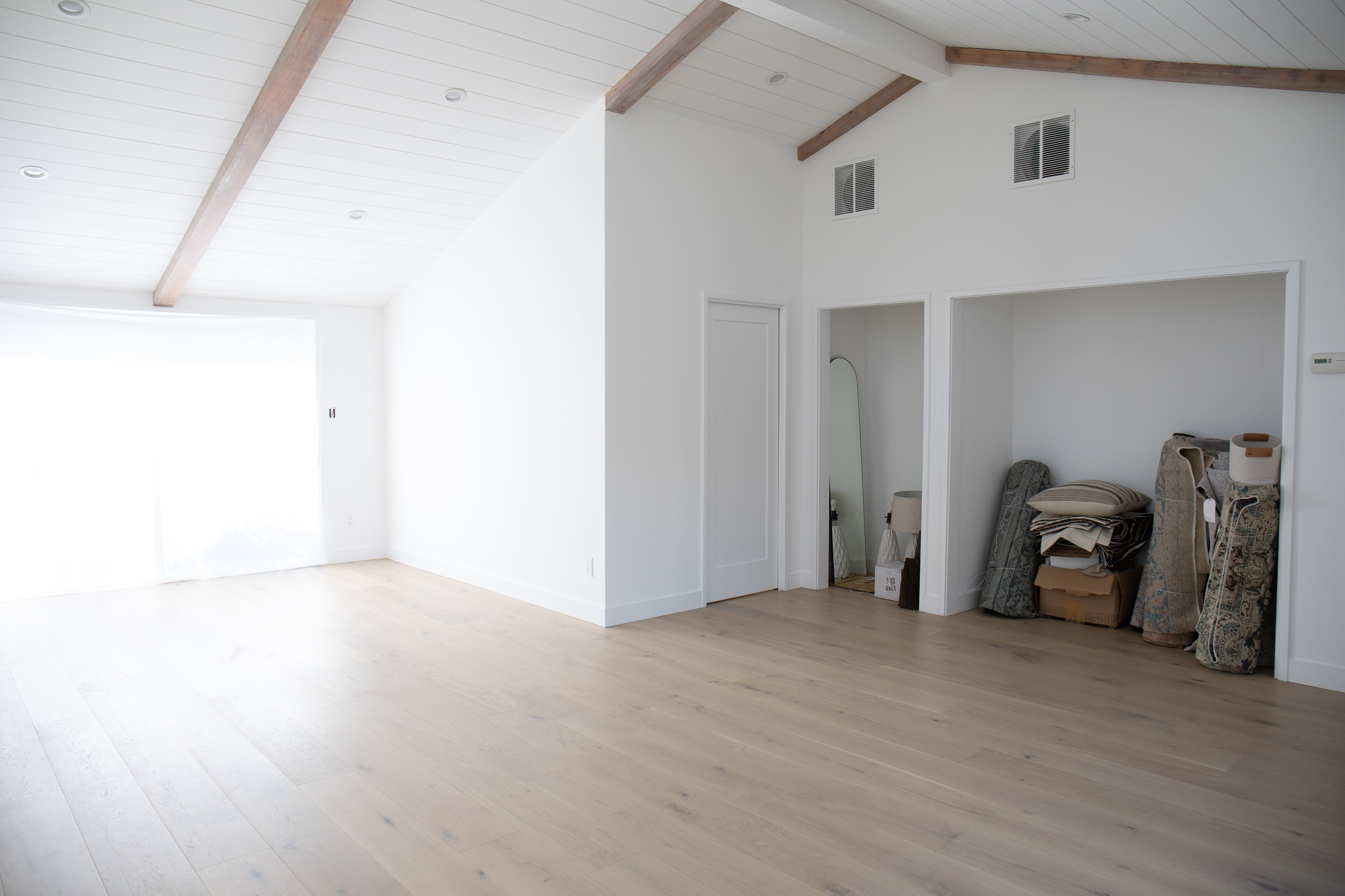 Vaulted ceiling, white shiplap ceiling paneling, master suite renovation